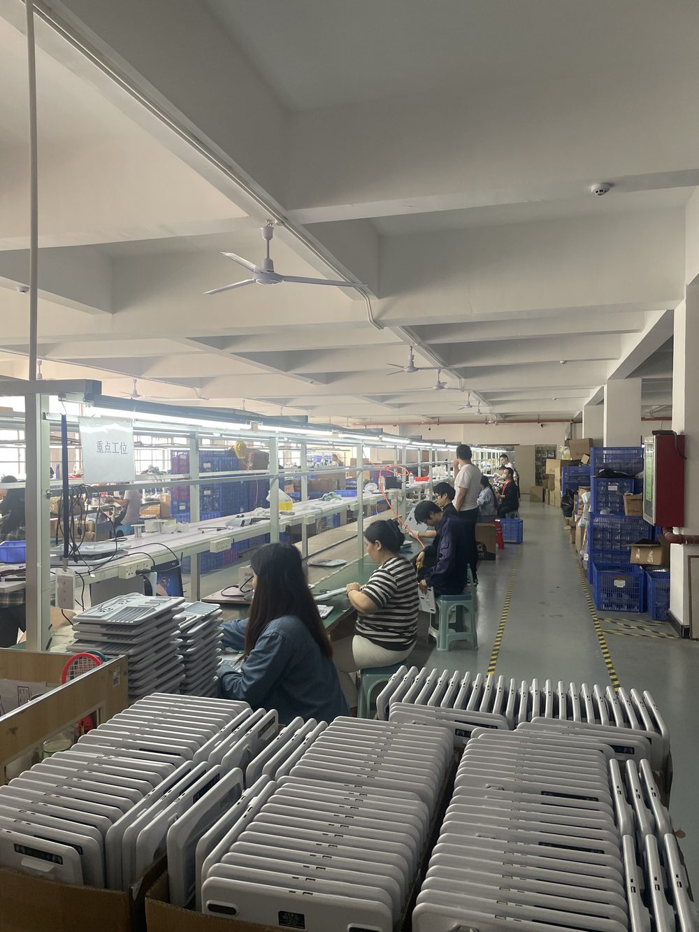 JINGOX assembly and QC production line with workers